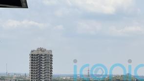 Scores of firefighters at scene of east London tower block blaze