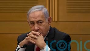 Former Israeli PM denies blame for deadly stampede