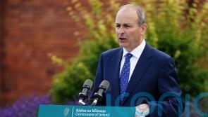 Irish premier calls on AIB to reconsider making 70 branches cashless