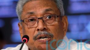 Human rights group seeks ex-Sri Lankan president’s arrest in Singapore