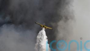 Homes saved as firebreaks halt blaze on Greek island