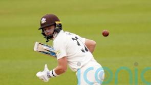 Ollie Pope’s half-century helps leaders Surrey edge ahead of Warwickshire