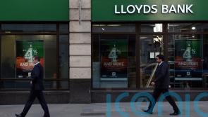 Lloyds profits fall as it sets aside £377m for loan defaults over living costs