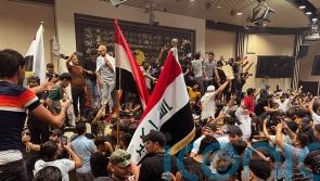 Followers of cleric enter Iraqi parliament in show of force