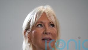 Dorries interview interrupted by off-screen altercation