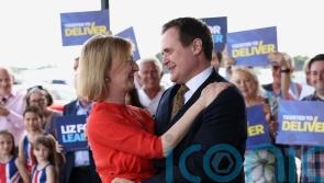 Truss plays down lead over Sunak as more senior backers boost her campaign