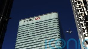HSBC rebuffs break-up calls and pledges to boost dividends