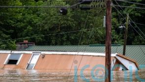 More rain hits Appalachian communities where 30 people died in flooding