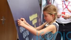 ‘Charming’ Charlotte enjoys Commonwealth Games visit with William and Kate
