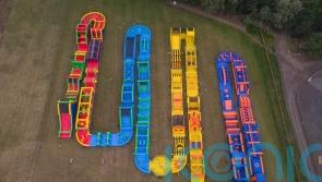 Adventure park unveils world’s longest inflatable assault course