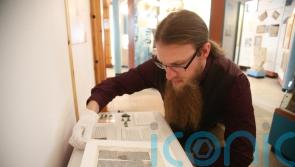 Page from 800-year-old bible on display at Glastonbury Abbey