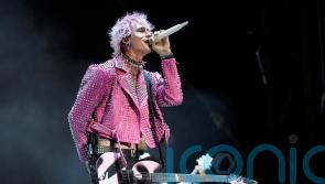 Machine Gun Kelly responds to vandal who defaced his tour bus