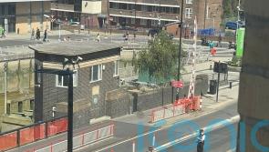Pistol found at scene after man shot by police