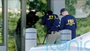 Suspect who tried to breach FBI office dies in stand-off