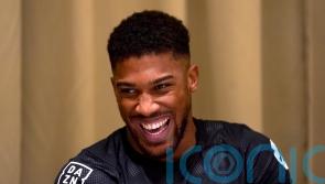 Relaxed Anthony Joshua eyes early stoppage in bid to reclaim world titles