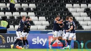 Two own goals in added time earn Millwall a draw at Swansea