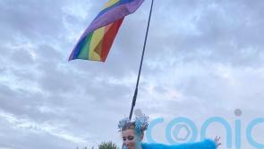 VIDEO: A 24-year-old teams summer festival furry coat and bikini with walking stick and two stoma bags to celebrate surviving bowel cancer