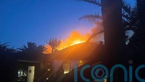 Fashion designer Giorgio Armani flees wildfire on Sicilian island retreat
