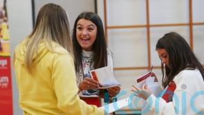 A-level students celebrate results after ‘rollercoaster’ experience