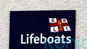 Girls rescued by lifeboat after becoming stranded on rocks