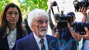 Bernie Ecclestone arrives at court to face £400m fraud charge