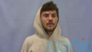 Three Arkansas officers suspended after video captures suspect being beaten up