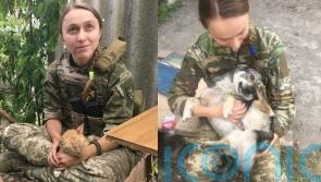 ‘Animal-loving’ Ukrainian sniper rescues abandoned pets from battlefield
