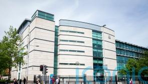 Two men appear in court charged with directing terrorism