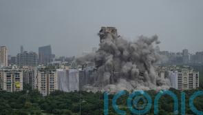 Two high-rise blocks in India demolished for violating building laws