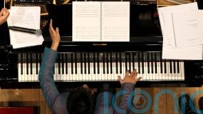 Playing music in childhood linked to sharper mind in later life – study