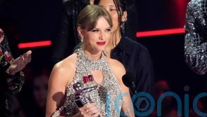 Taylor Swift announces new album as she scoops top MTV VMA prize