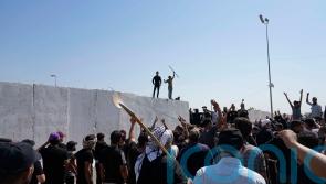 15 dead as followers of Iraqi Shiite cleric storm government palace