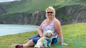 Shopworker who shed weight before hitting the menopause bursts into tears of joy after losing 7st 8lb and fitting into slinky Levi&rsquo;s jeans