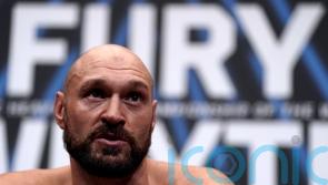Tyson Fury makes ring return… as heavyweight champ floors WWE star in Cardiff