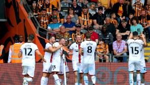 Blades win at Hull to go top of the Championship