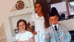 Flowers and candles at Tallaght home of siblings who died in violent incident