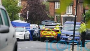 Man shot dead by armed police after chase ends in residential street