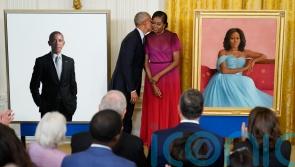 Obamas unveil their White House portraits