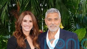 George Clooney reveals his dance moves are put to good use both on and off set