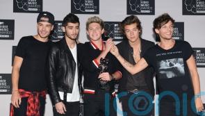 Louis Tomlinson hints at One Direction reunion during chat with Lorraine Kelly