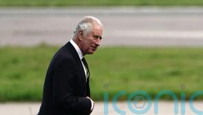 Grief-stricken King lands in London as duty calls for new monarch