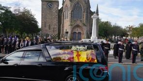 Balmoral pauses to remember &lsquo;special&rsquo; moments with Queen as coffin passes by