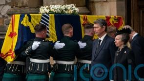 Slim chance of rain for mourners waiting to see Queen’s coffin