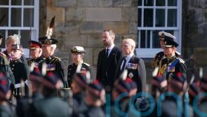 King leads procession to St Giles’ Cathedral behind Queen’s dressed coffin