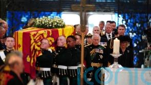 King leads procession behind Queen’s coffin as Harry promises to ‘honour’ father
