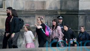Well-wishers wait 12 hours to see Queen&rsquo;s coffin in Edinburgh cathedral