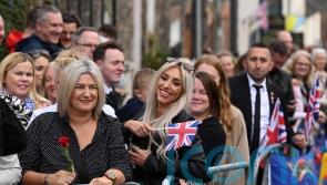 Thousands flock to village with royal connections to welcome King