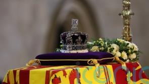 Lying in state: Visitors take a few moments to say goodbye to the Queen