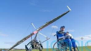 Reach for the sky: Brain cancer patient completes microlight flight for charity