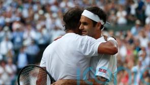 Roger and out: Rafael Nadal leads the tributes to a sporting great
